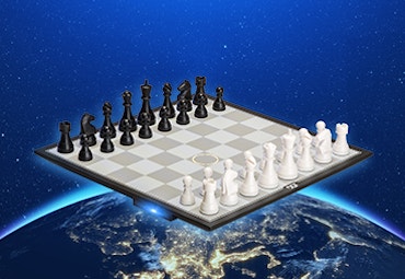 chess board with chess pieces in black and white over image of the world background